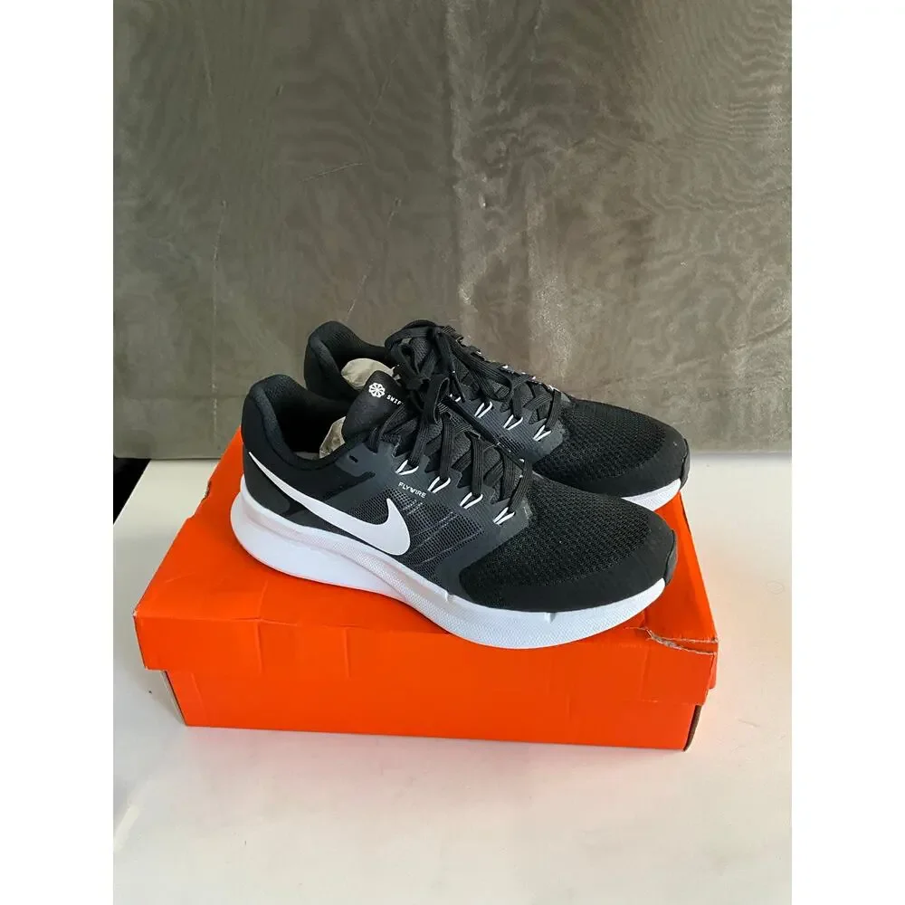 Nike Run Swift 3 sneakers in black and white